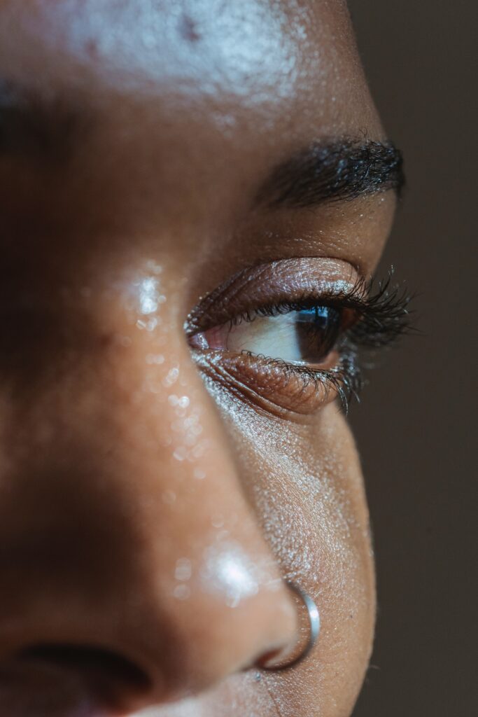 Up close shot of a Black woman's face.