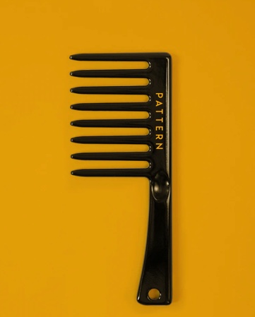 A black wide-tooth comb