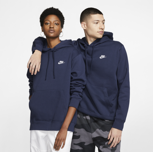 A promotional photo for the Nike Club Pullover Hoodie featuring a male and female model