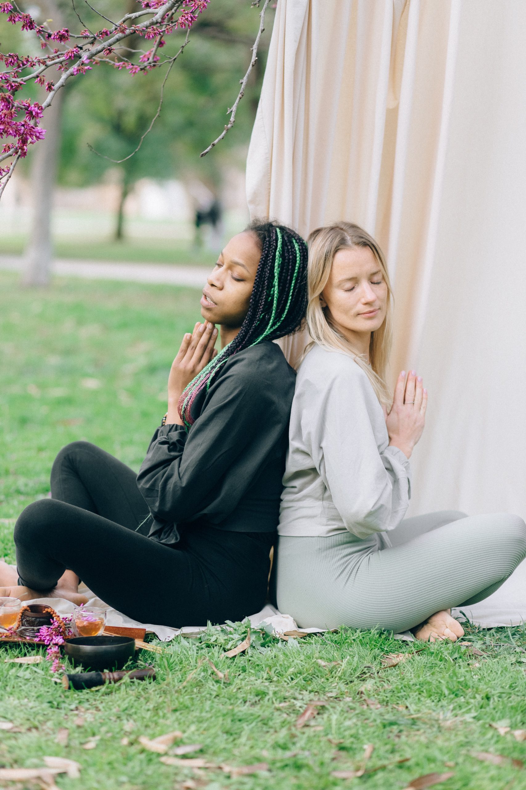 Two women practicing a yoga pose