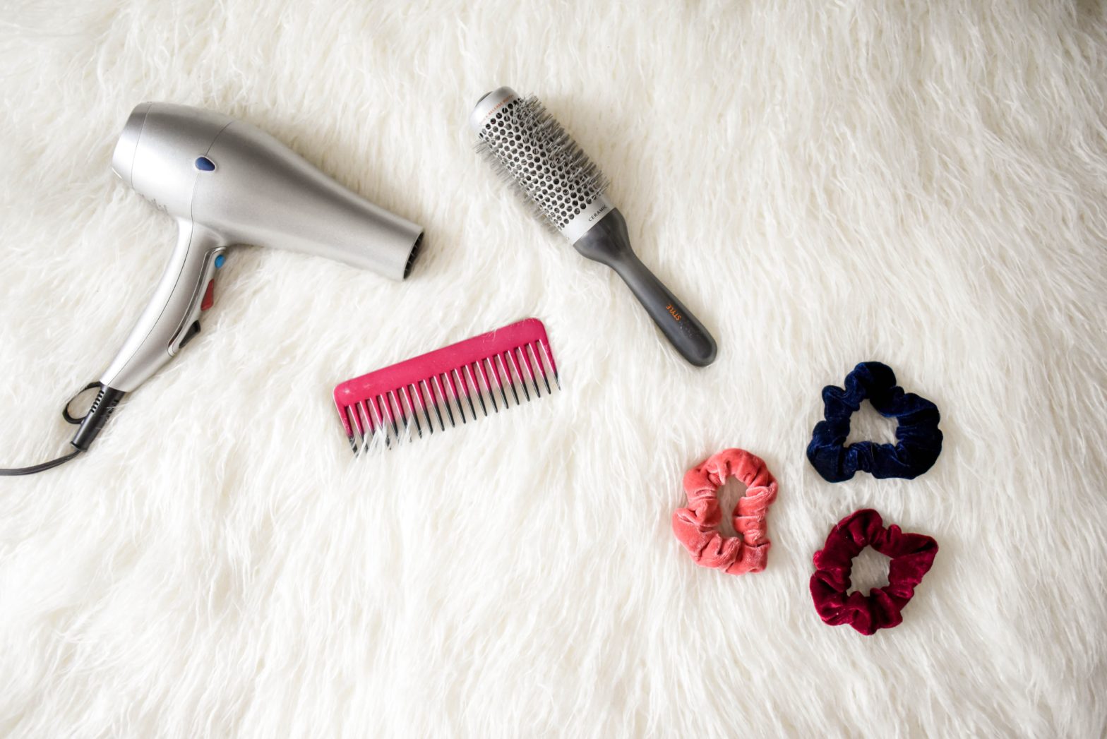 4C Hair Tools placed on a fluffy white blanket