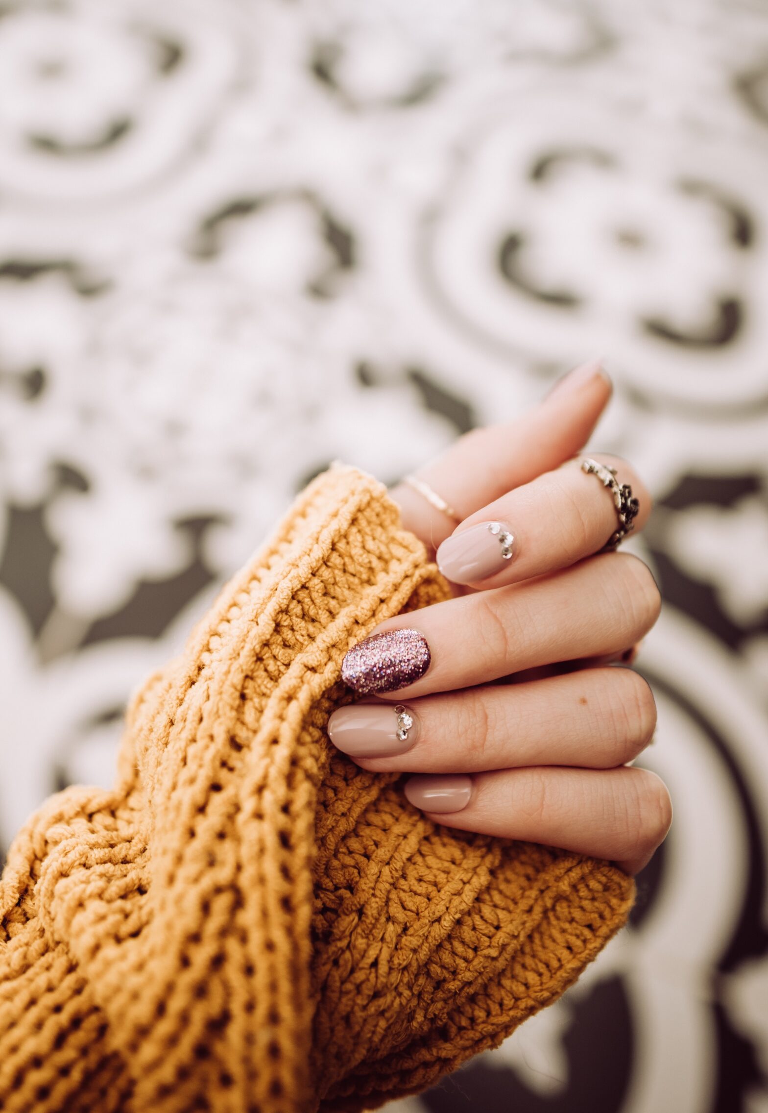 If you’re looking for nail designs with diamonds, find inspiration from this gem guide and choose from some glam, simple, and alternative looks. Pictured: nail design with diamond gems.