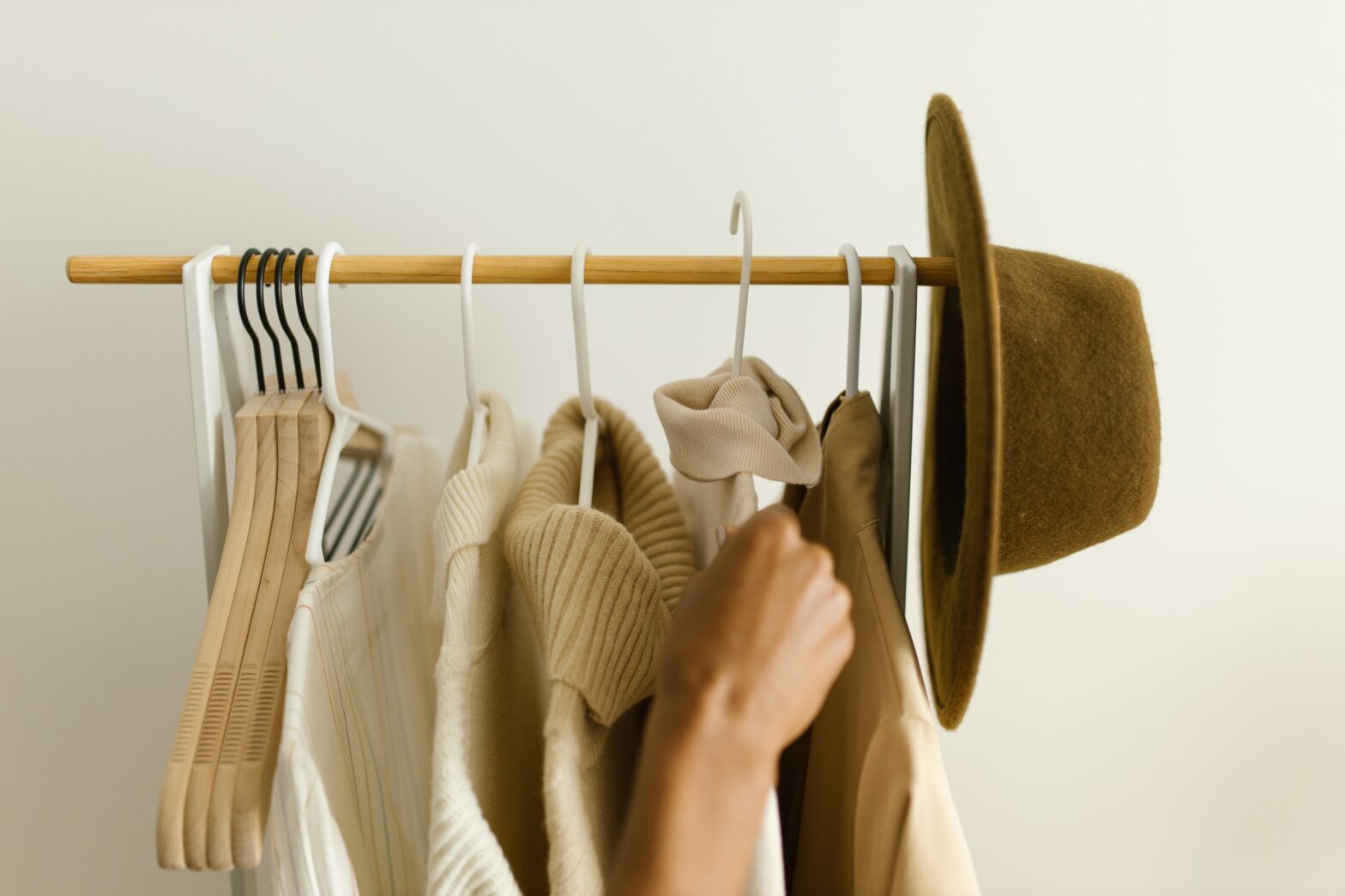 Wantable and Stitchfix are two fashion subscription boxes to be on the lookout for. In today's article we compare both. Pictured: a clothes rack with shirts and a hat on it.