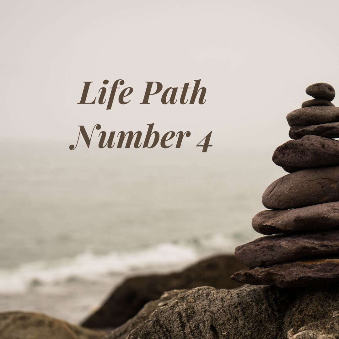 Learn how Life Path Number 4 affects day to day life and what it means for your purpose. Pictured: A rock pedestal trail marker near the ocean.