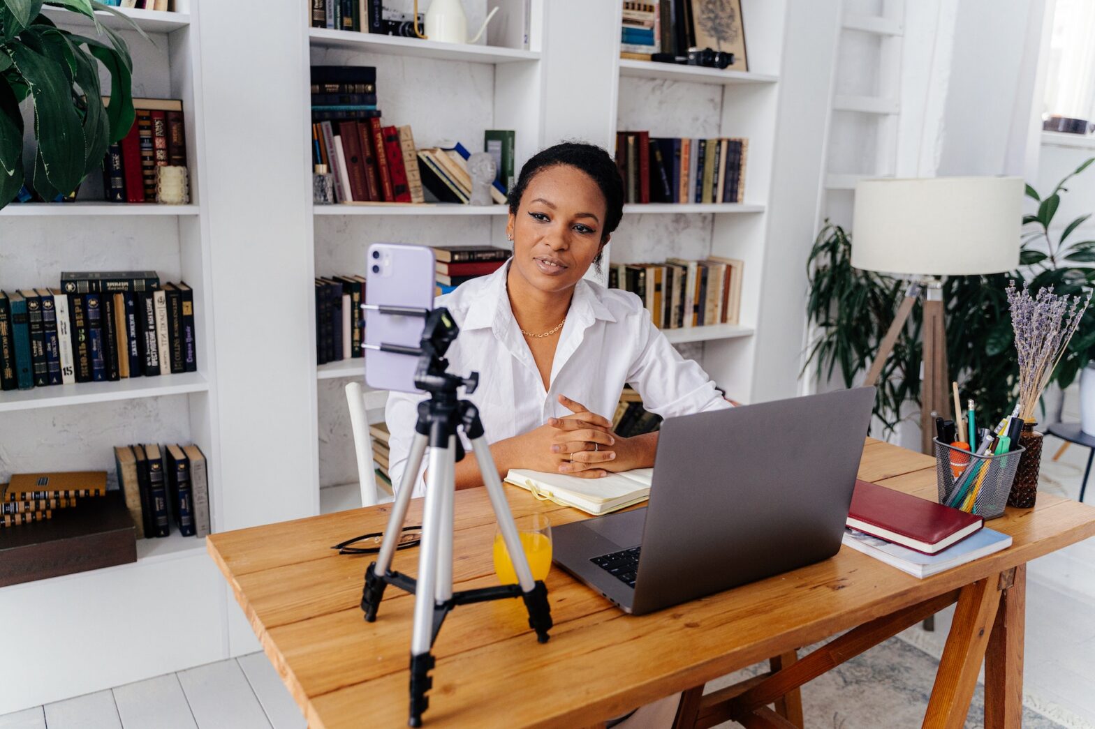 A woman in her at-home office on a video call