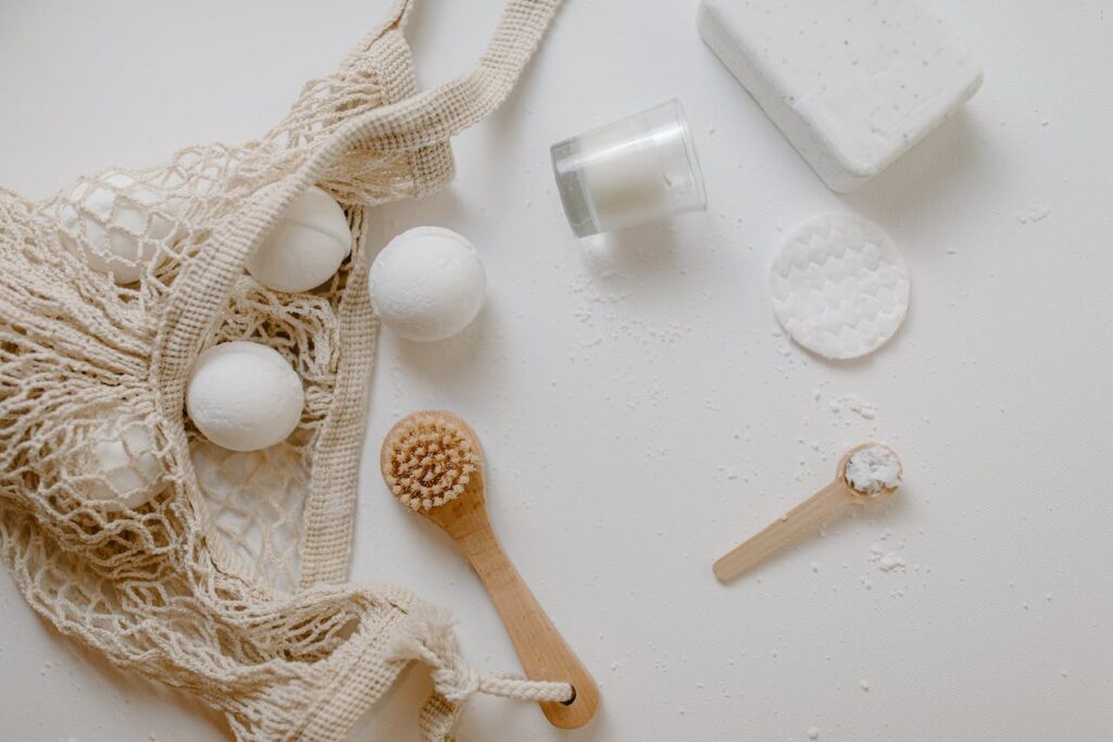 Bath bombs, scrub, and brush on a table