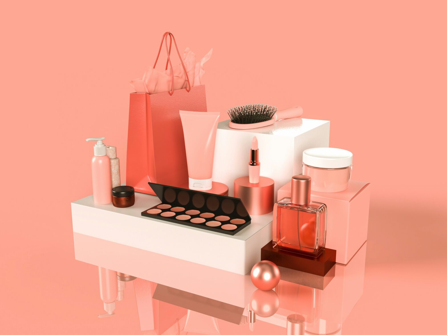 Assortment of beauty products in front of a peach background