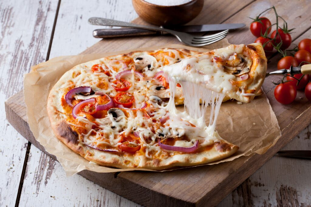 There's nothing better than crust, cheese and pizza sauce with your favorite toppings. Make a heart-shaped pizza for the perfect Galentine's Day celebration. Pictured: Pizza