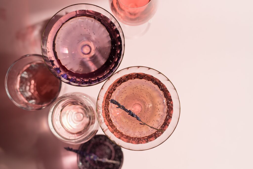 Celebrate Galentine's day with your favorite pink and red cocktails or mocktails. This idea is easy and great for themed-drinks. Pictured: Pink cocktails