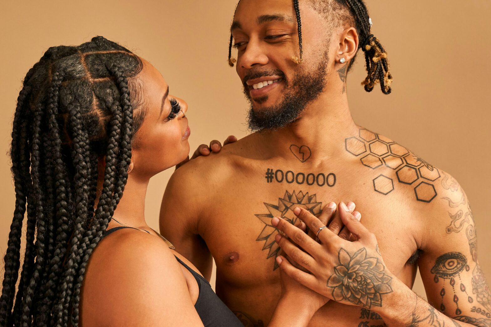 Aquarius Aquarius Compatibility pictured: tattooed couple smiling