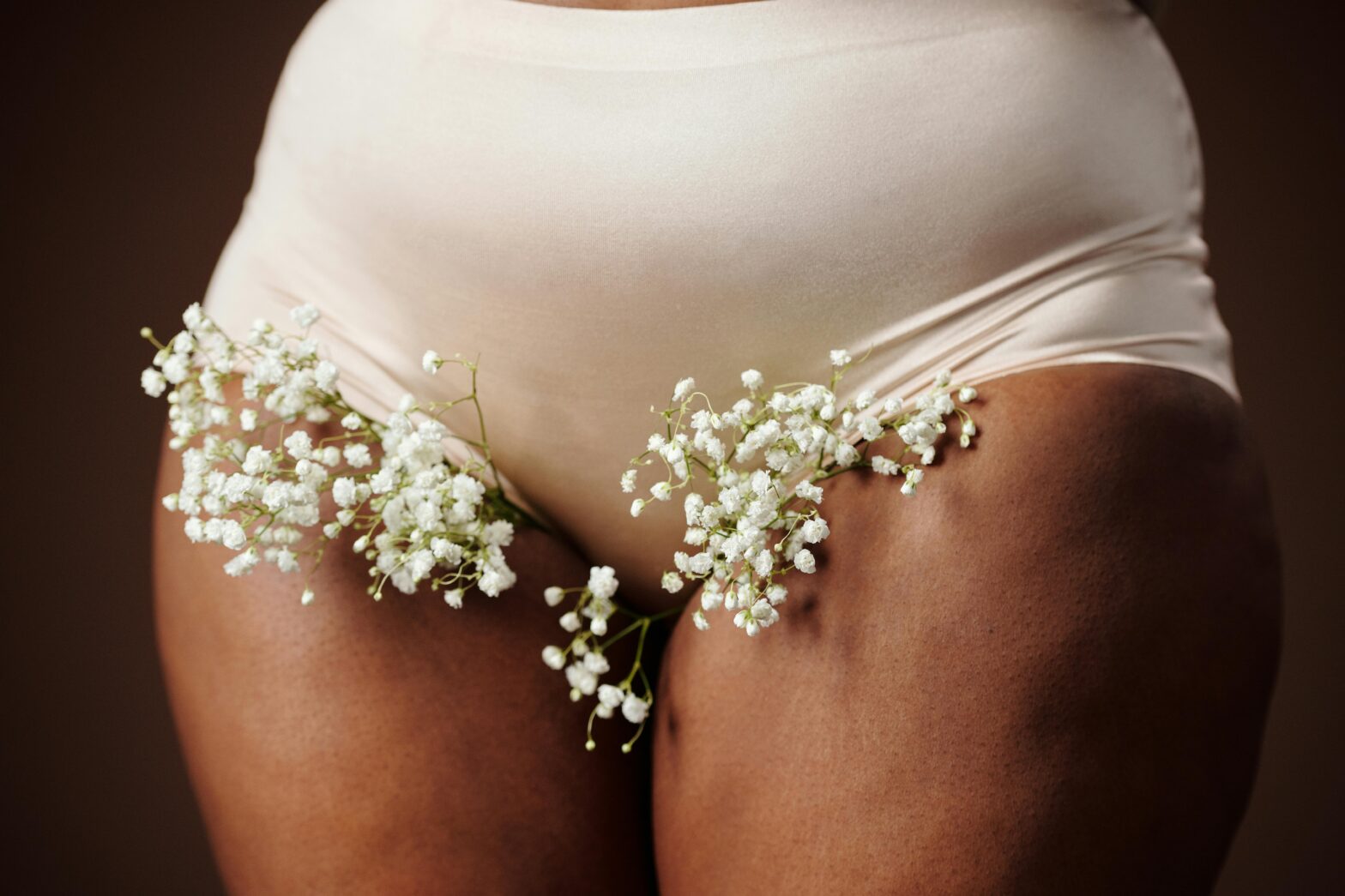 woman-in-white-panty-with-babys-breath-flowers