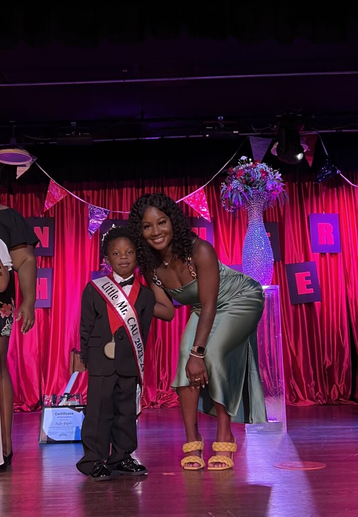 Young Single Mother Gabrielle Smith posing with her son after he became Little Mr. CAU 2023-2024