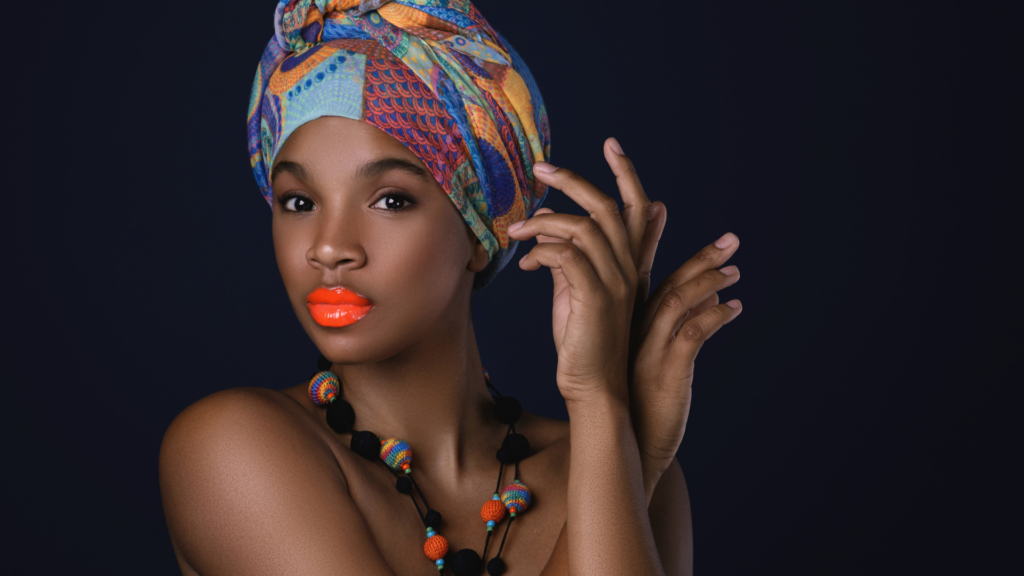 Woman with Shawl on Her Head and Neon Lipstick black beauty trends