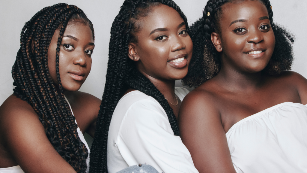 3 young black women showing advocacy for culturally competent care . 