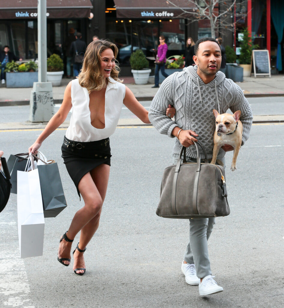 National Dog Day pictured: Chrissy Teigen and John Legend with their dog