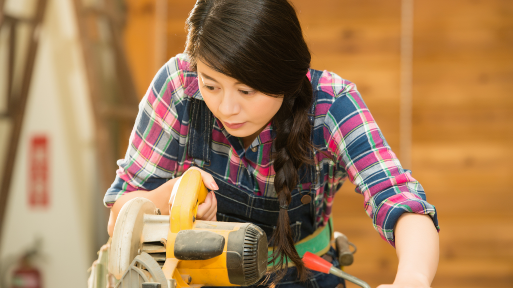 Female Carpenter Using Circular Saw