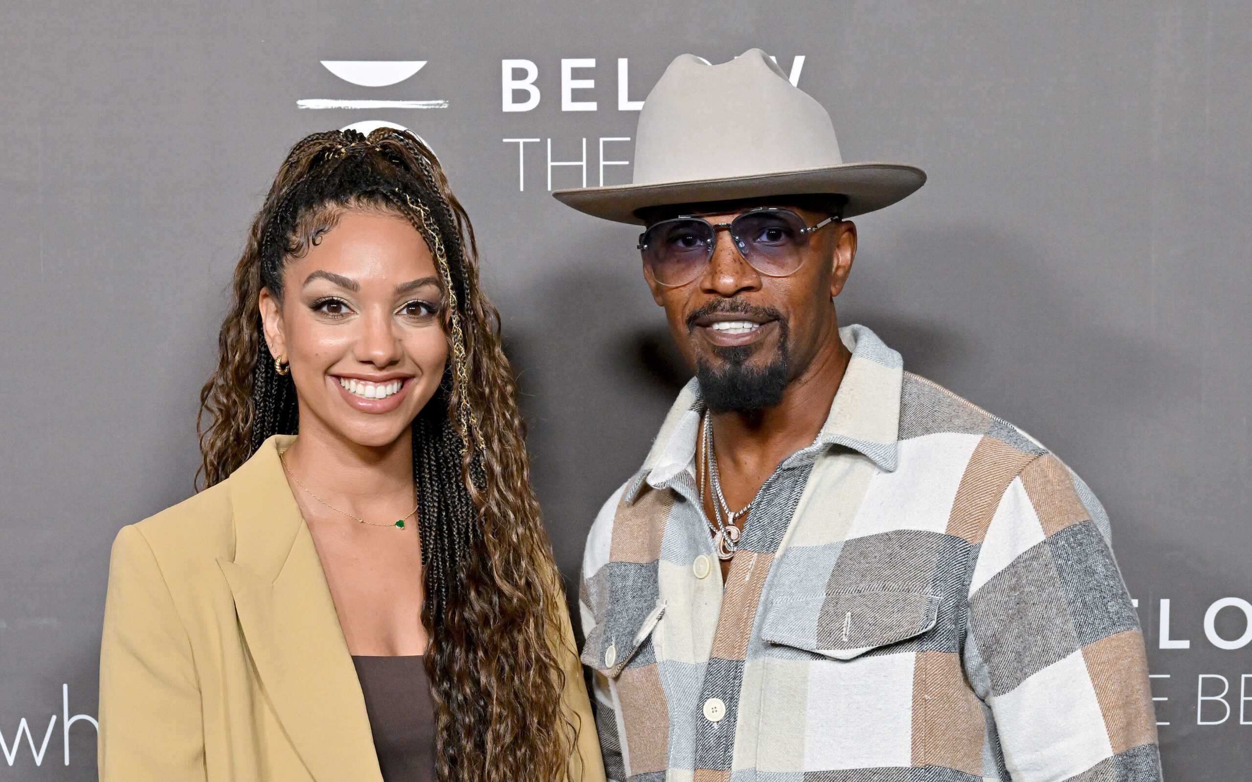 Jamie Foxx and his daughter pose fro a photo at an awards ceremony