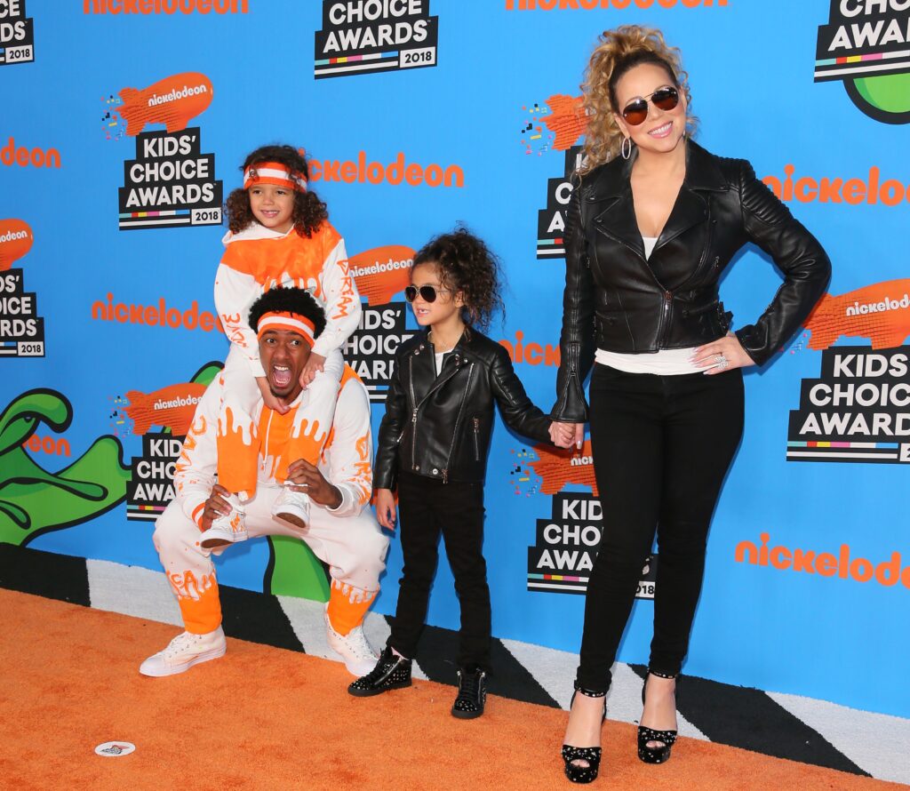 Mariah Carey and Nick Cannon arrive with children Monroe Cannon (2R) and Moroccan Scott Cannon (top)  at the 31st Annual Nickelodeon Kids' Choice Awards 