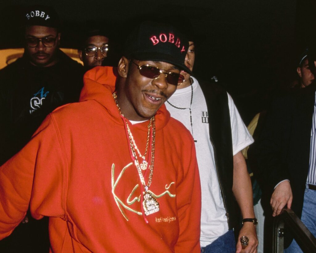 Bobby Brown wears a red "Karl Kani" sweatsuit in the United States, circa 1990.