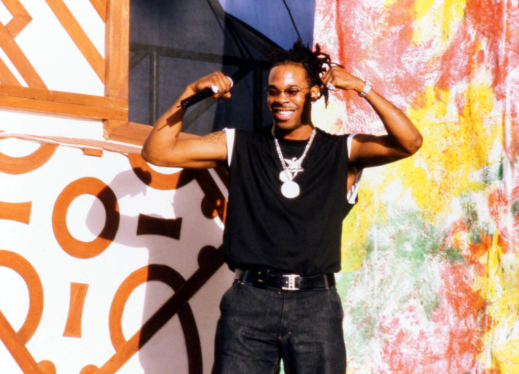 Busta Rhymes, in all black attire with a chain around his neck, is performing at ’One Love - The Bob Marley tribute show’ on 4 December 1999 in Oracabessa, Jamaica.