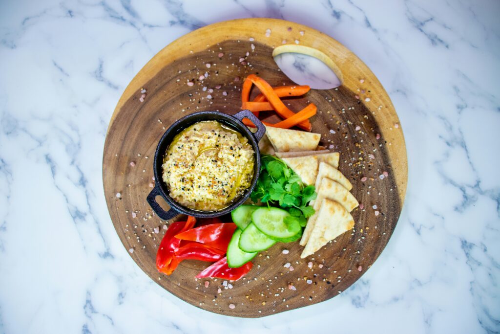 1 Year Old Lunch Plate of hummus, pita and vegetables